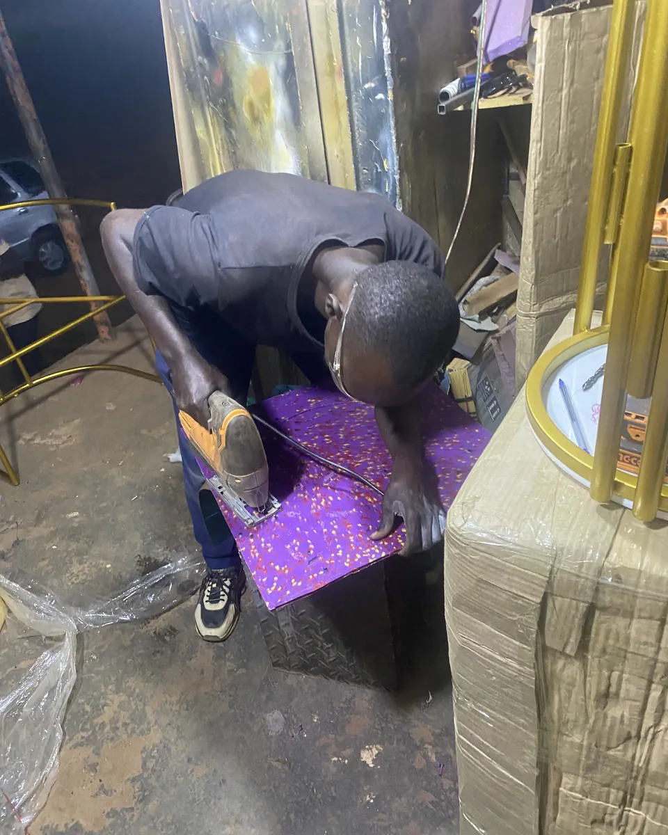 Cutting a recycled plastic sheet for a client order