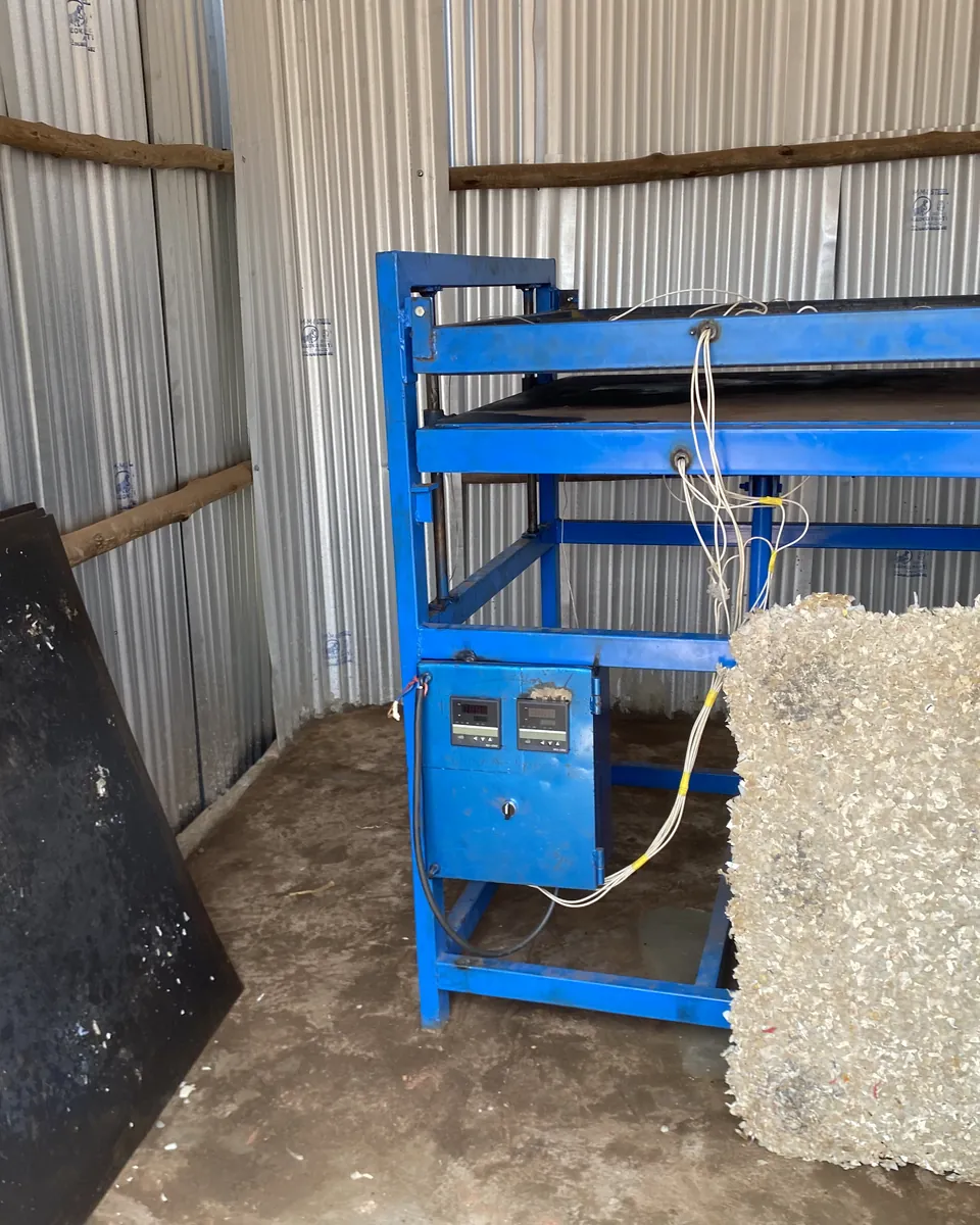 Heat press used to make recycled HDPE sheet