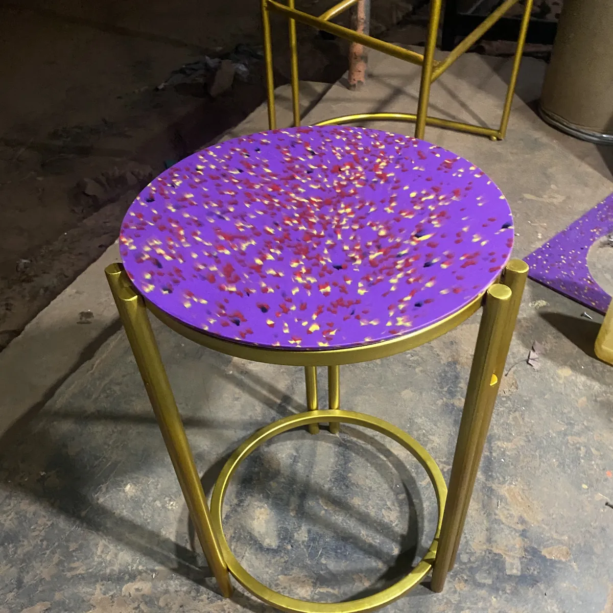 Recycled plastic stool with a purple speckled top